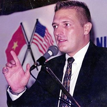 Dirk speaking publicly in Vietnam